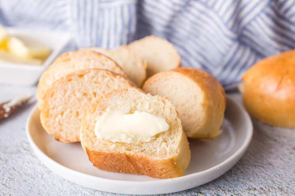 Easy-White-Bread-Baguette-small-butter-on-it